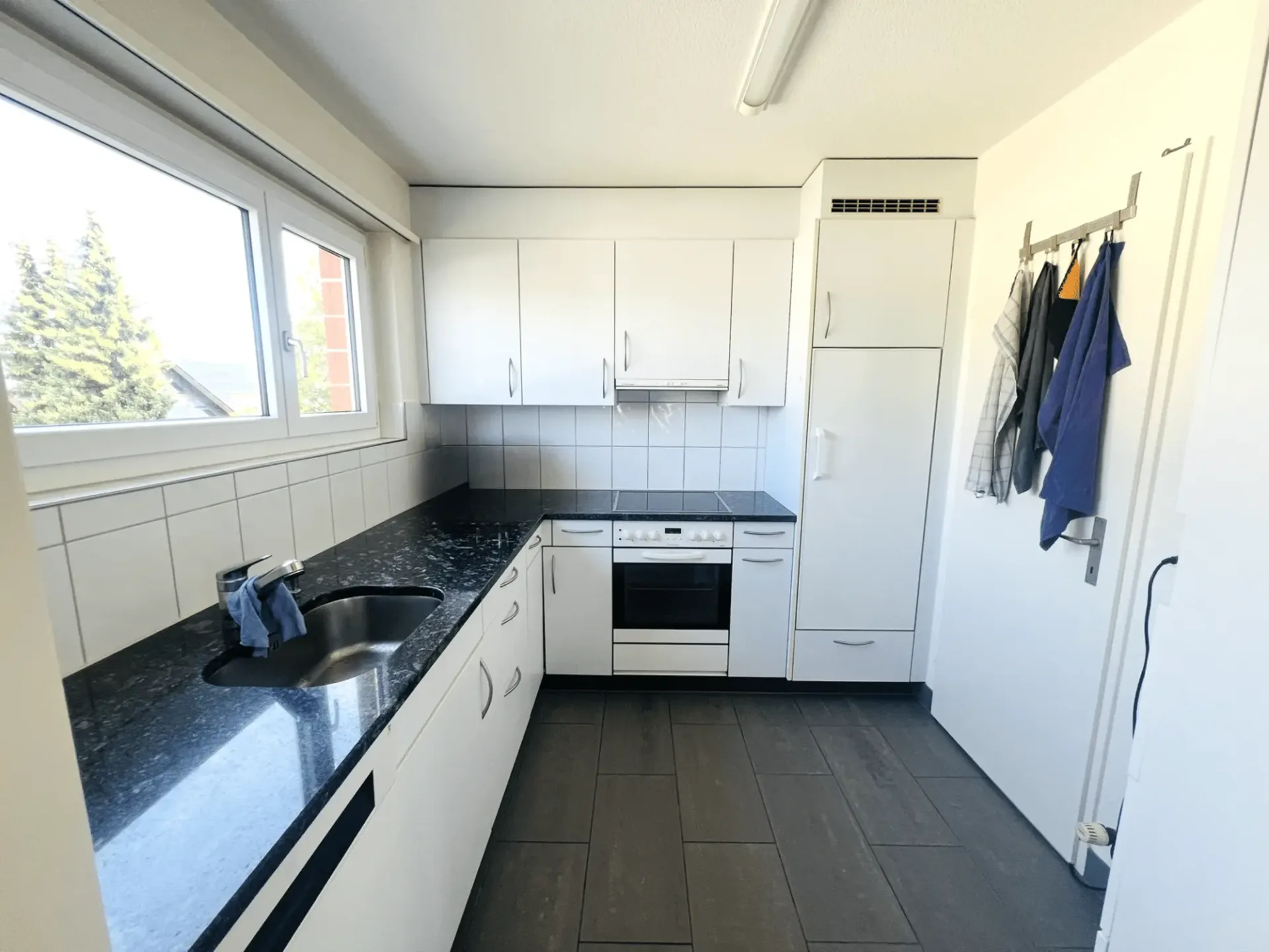 Appartement lumineux 4.5 pièces avec balcon dans un quartier résidentiel populaire à louer