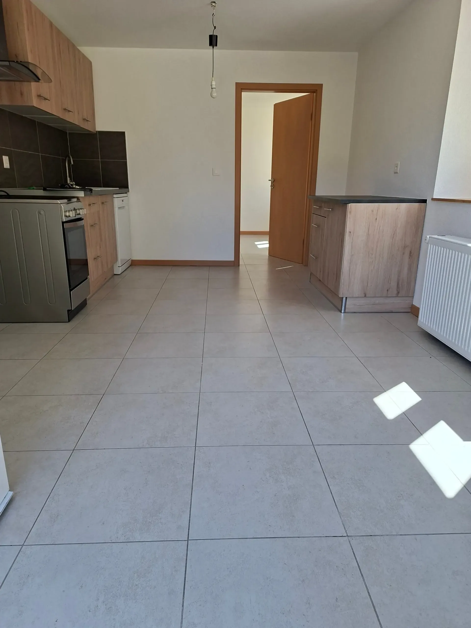 Appartement 3 pièces lumineux au rez-de-chaussée à Le Locle