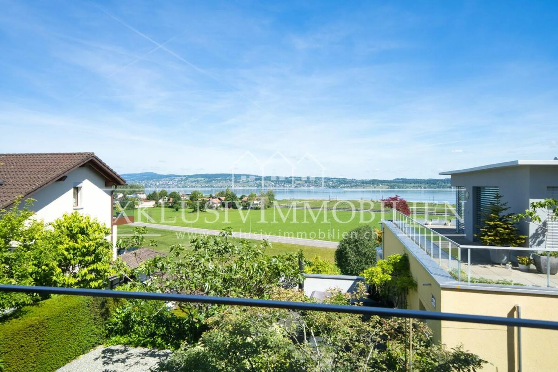 Exklusives Wohnen mit See- & Weitblick und lichtdurchflutetem Wintergarten