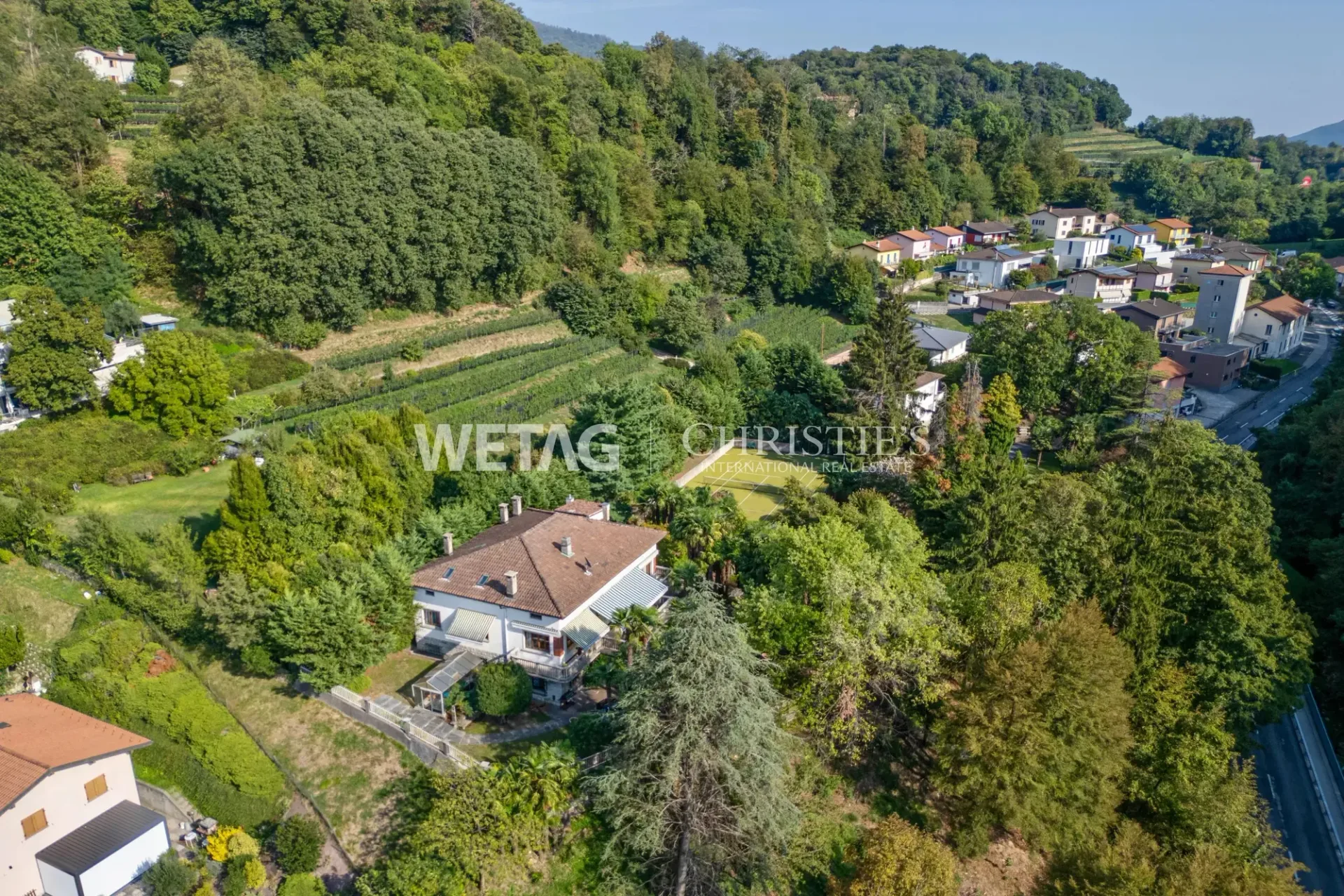 Lugano-Castel San Pietro: Elegant Villa in a green oasis with tennis court for sale ? First home