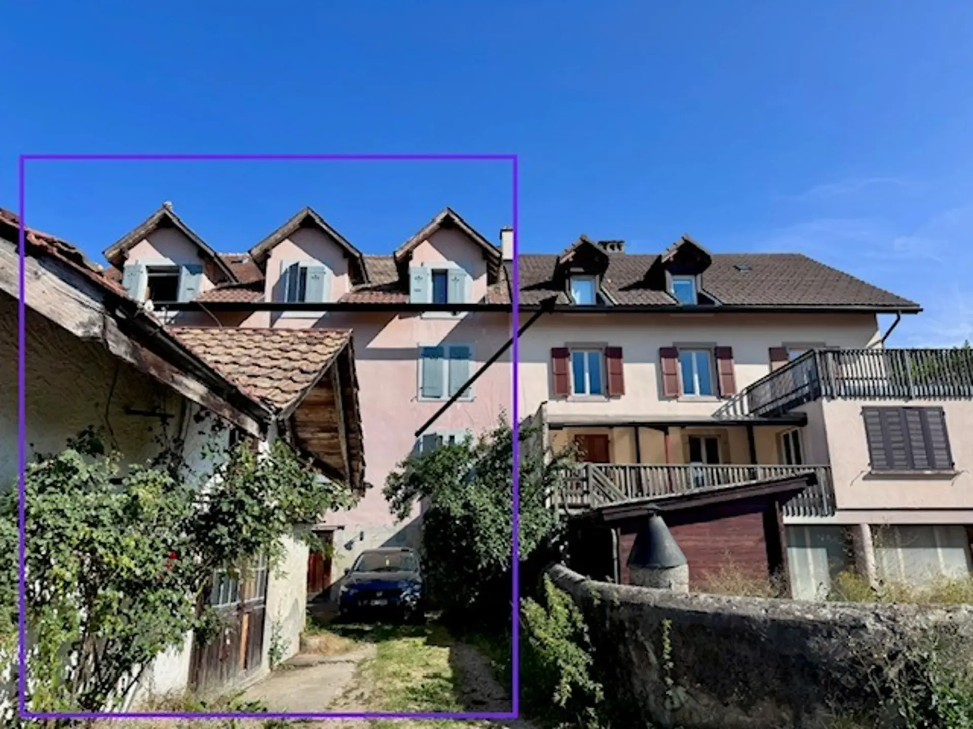 Charaktervolles Gebäude mit großem Garten im Herzen des Val-de-Ruz