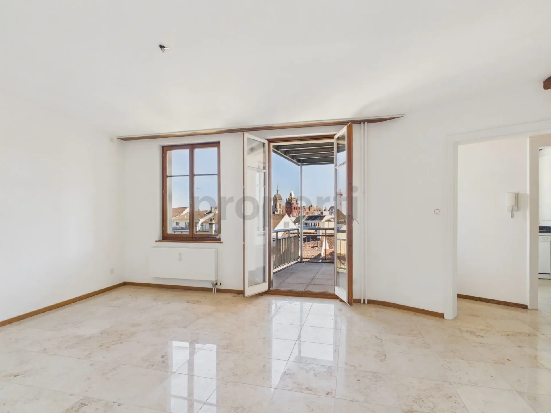 Charming living with balcony and historic flair