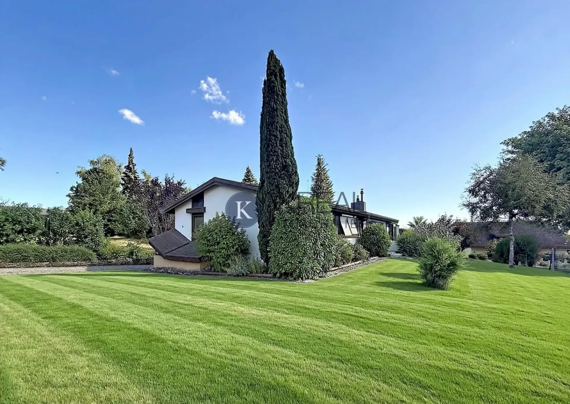Einfamilienhaus mit 4.5 Zimmern und Garten