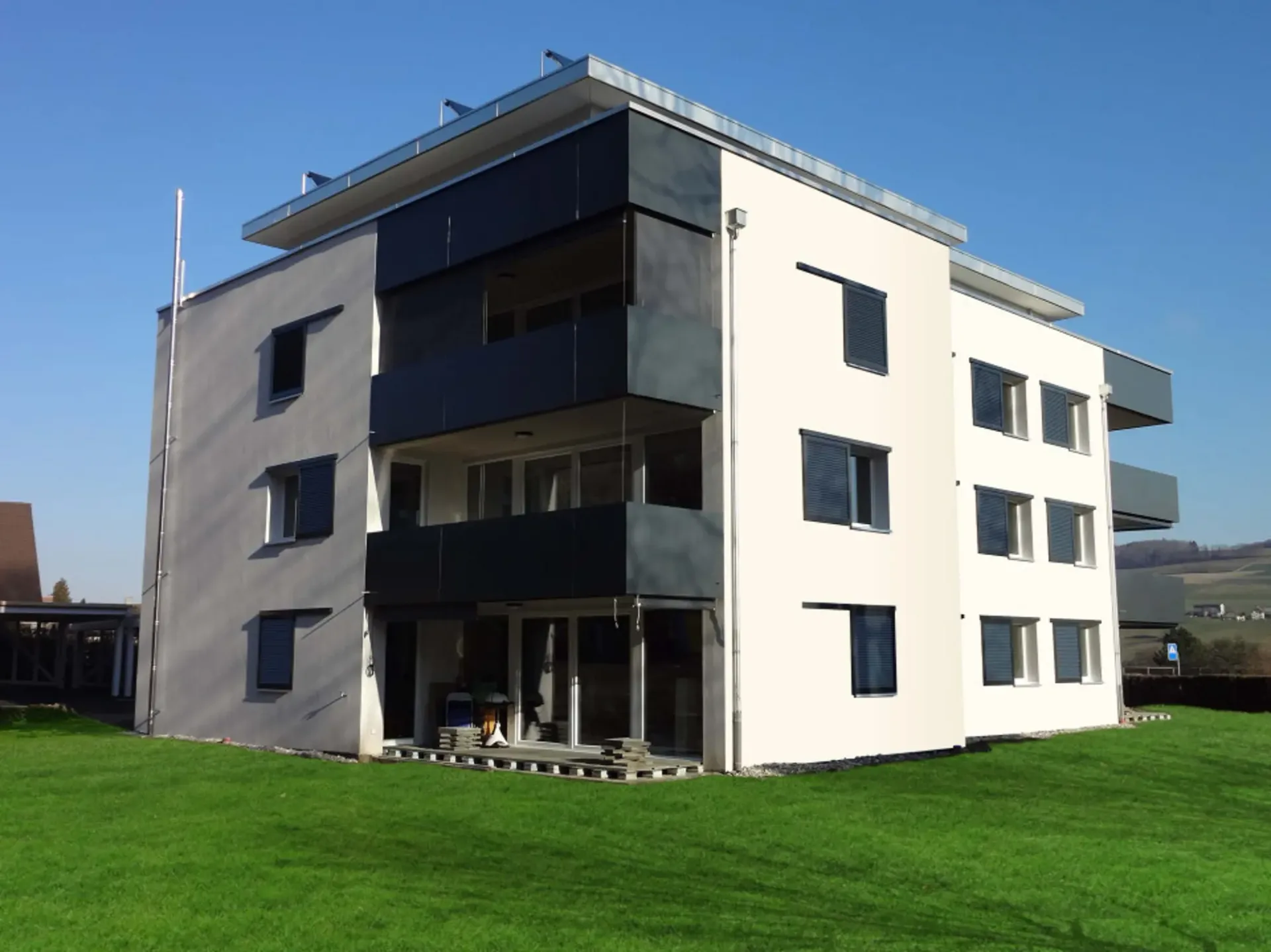 Wohnung mit 4.5 Zimmern und 2 überdachten Parkplätzen in Lucens