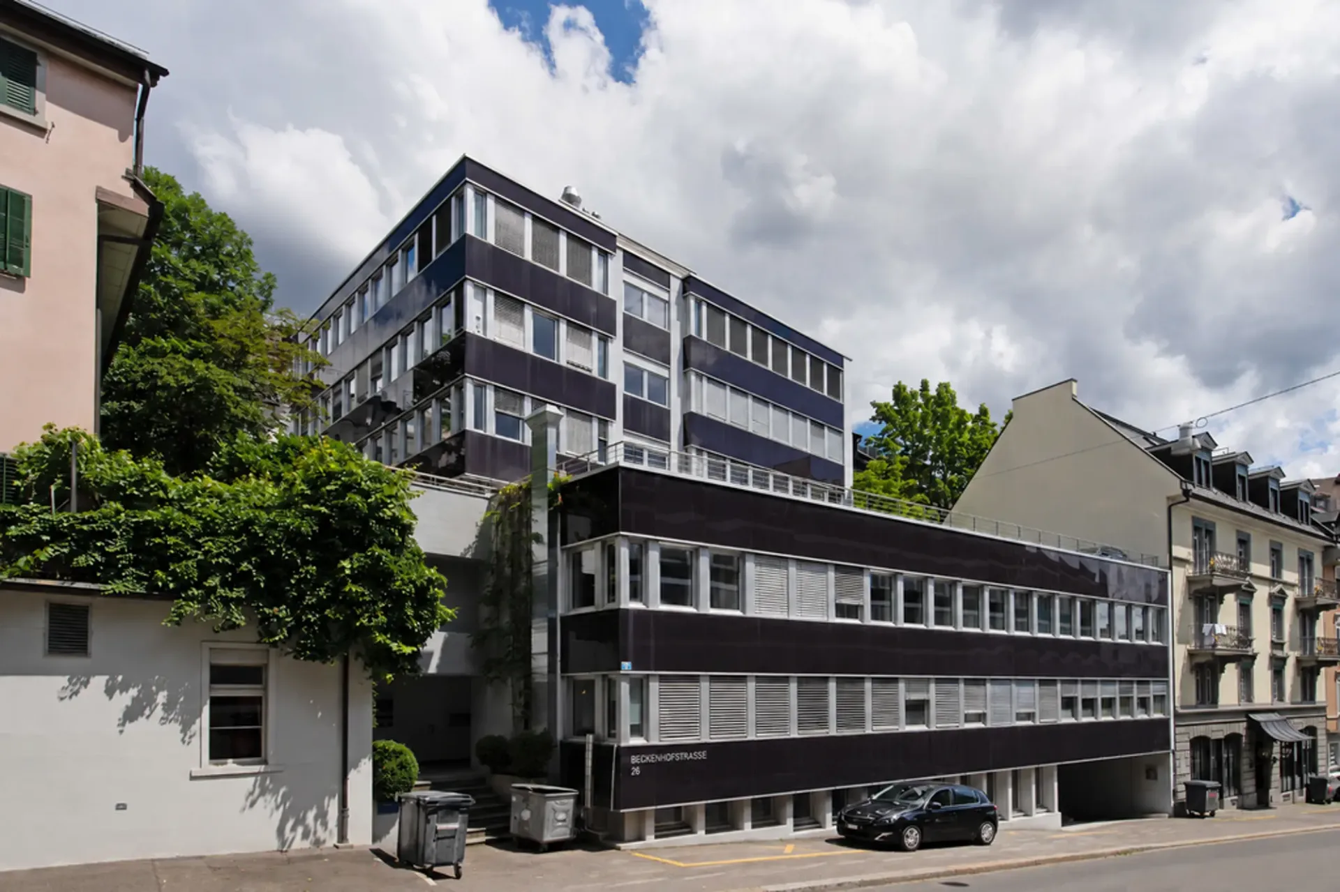 Centrally located parking spaces for smaller vehicles