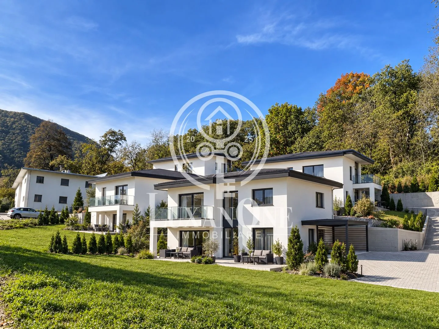Terrain à bâtir exclusif à Arcegno – projet approuvé pour 4 villas