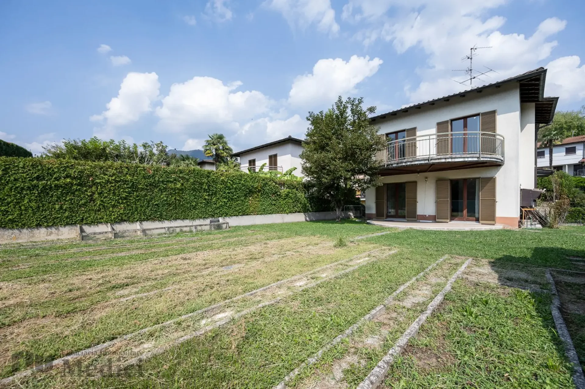 Maison unifamiliale avec grand jardin