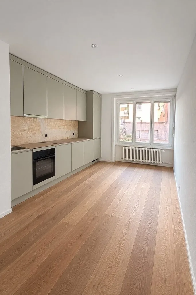 Grand logement rénové au centre ville de Lausanne.