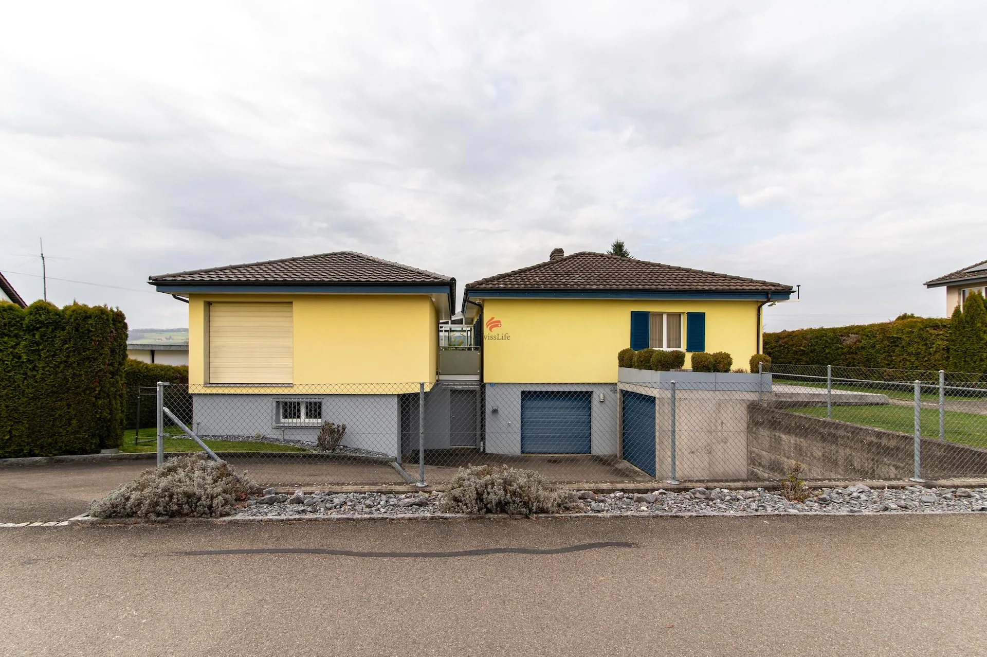 Einfamilienhaus mit Werkstatt + Atelier