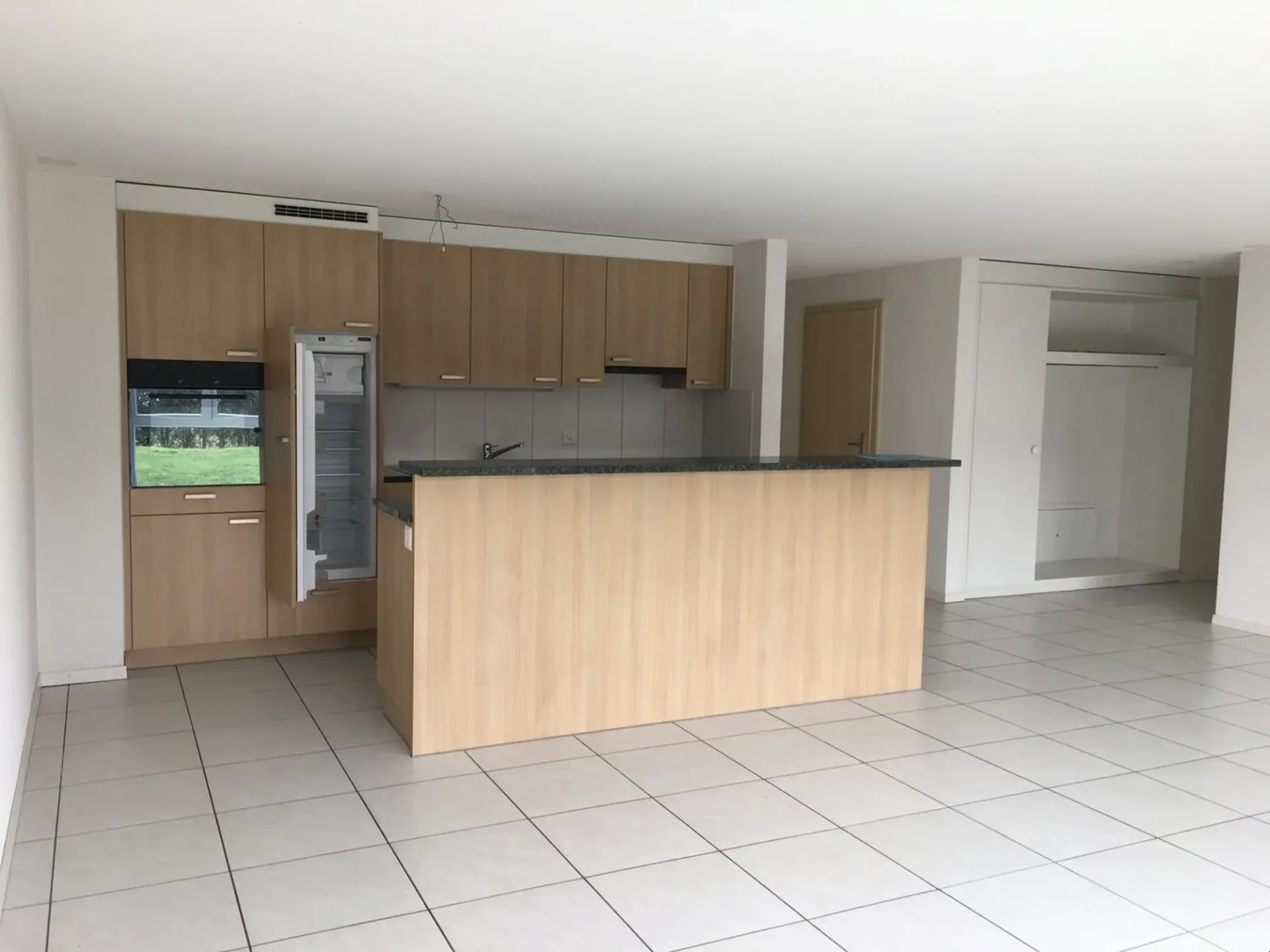 Appartement au rez-de-chaussée avec espace de sièges
