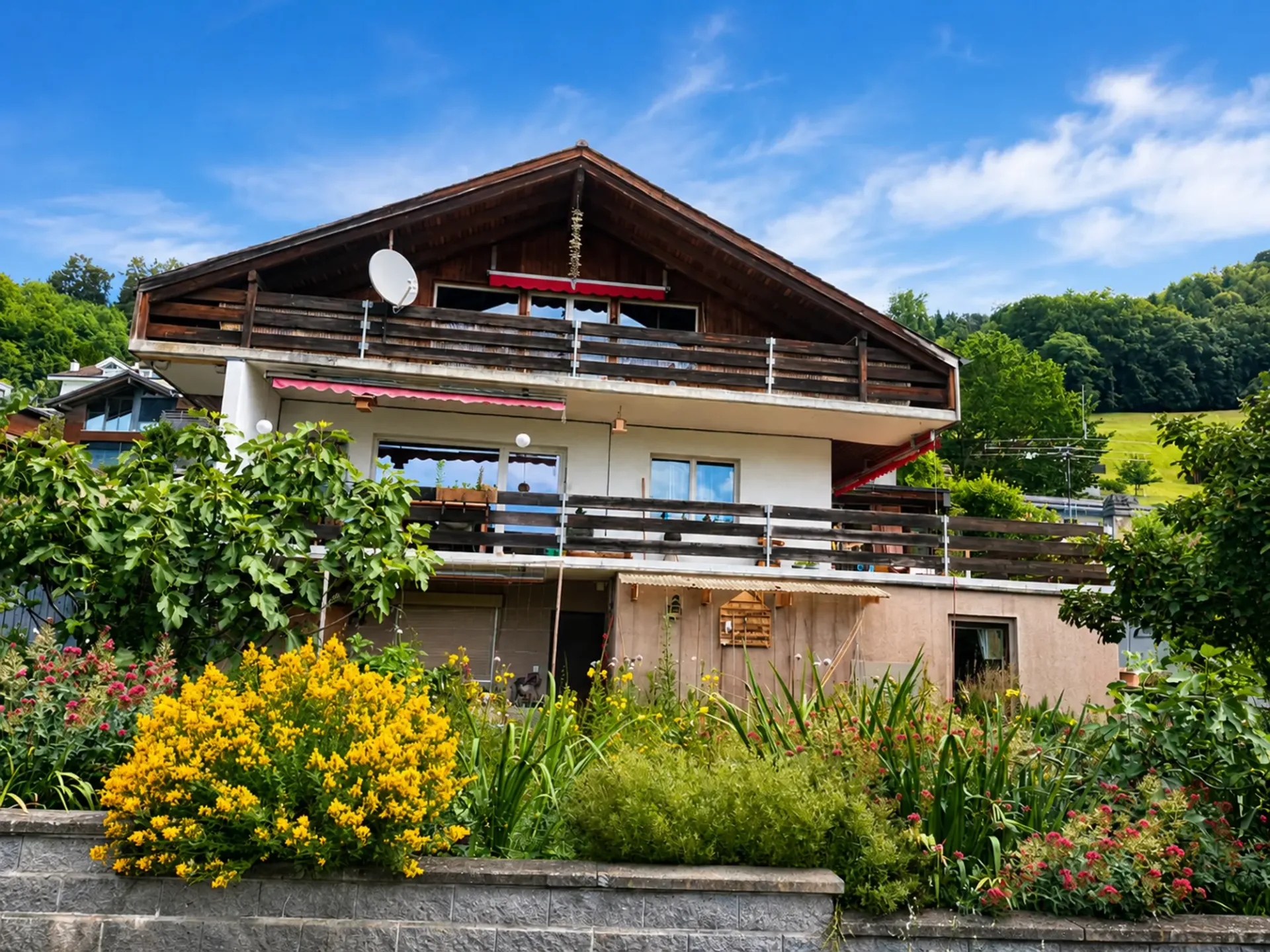 Charmantes Einfamilienhaus mit Studio und traumhafter Seesicht – Wohnen über dem Thunersee