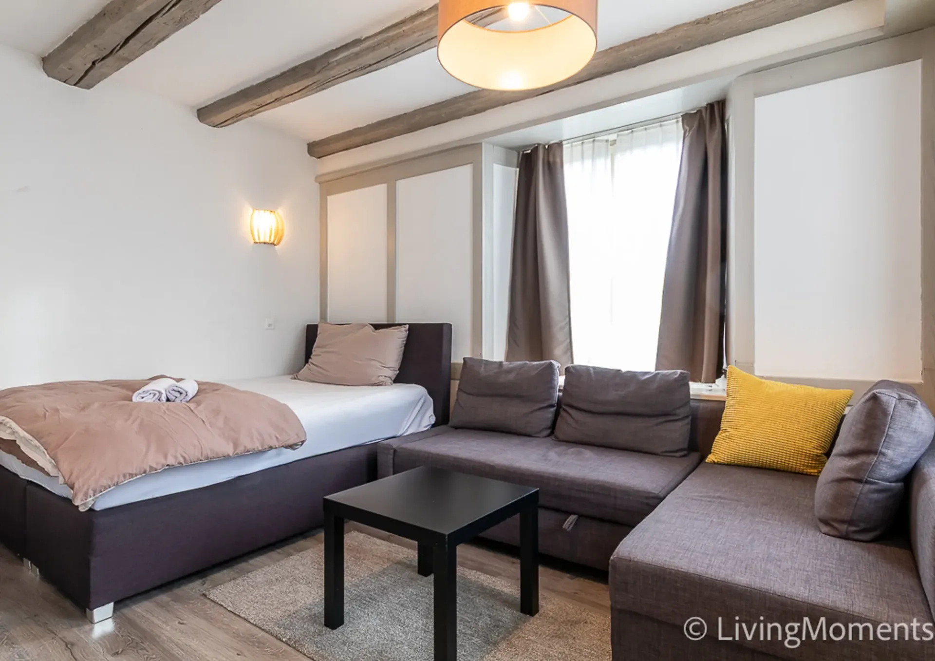 Furnished 1-room apartment with outdoor seating area