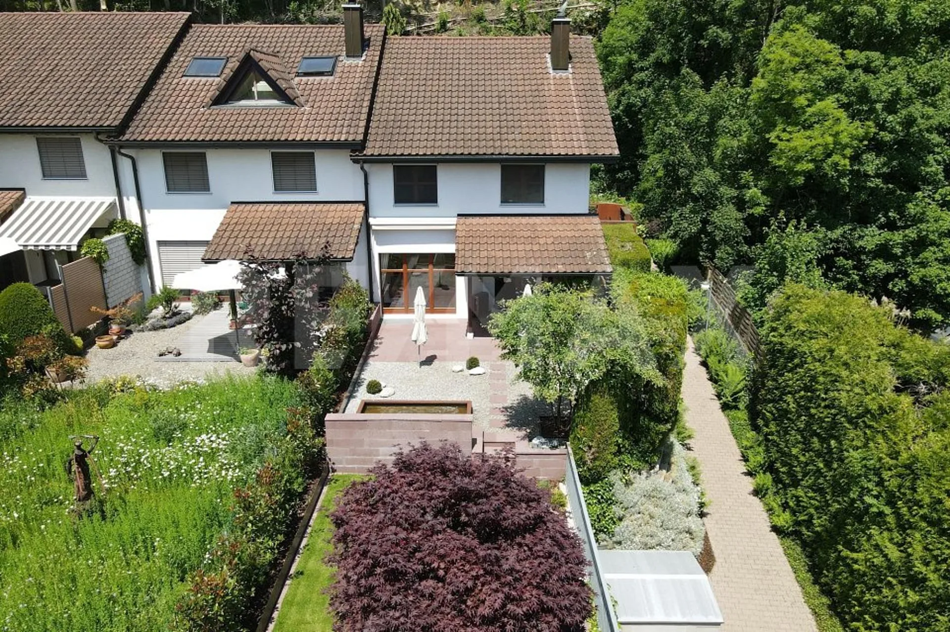 Familienfreundliches Haus mit Gartenidylle und Ausbaupotenzial
