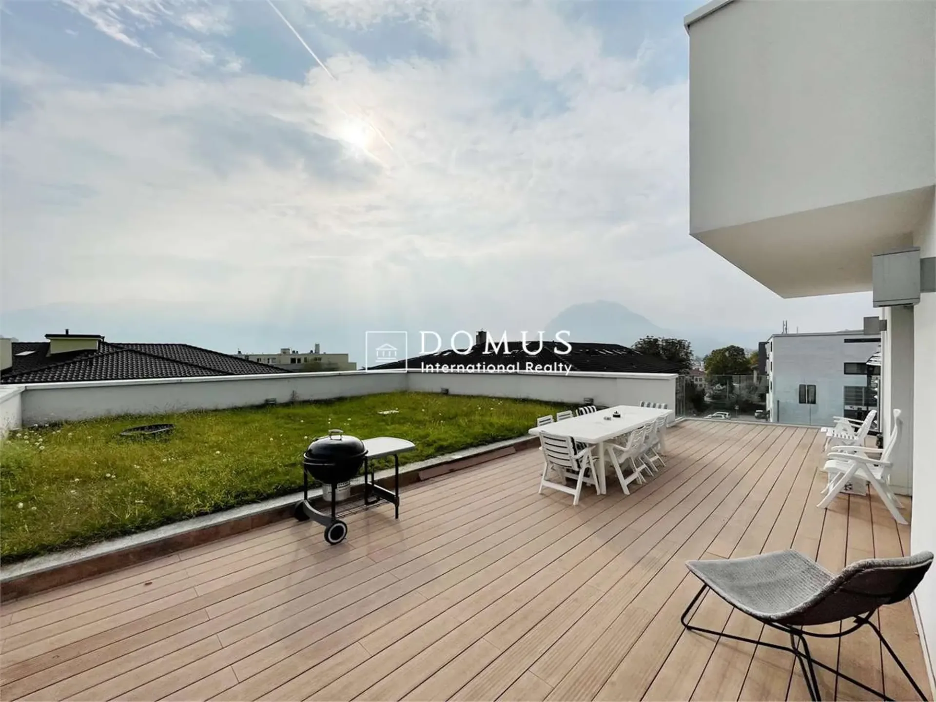 Moderno 4.5 locali, attico, con giardino