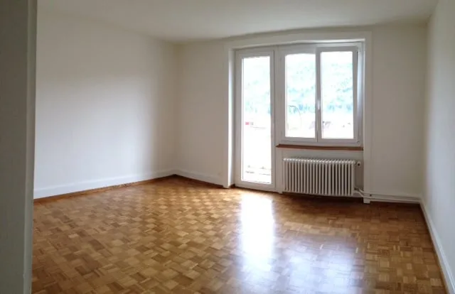 Appartement de 4 pièces avec balcon et vue dégagée sur la verdure