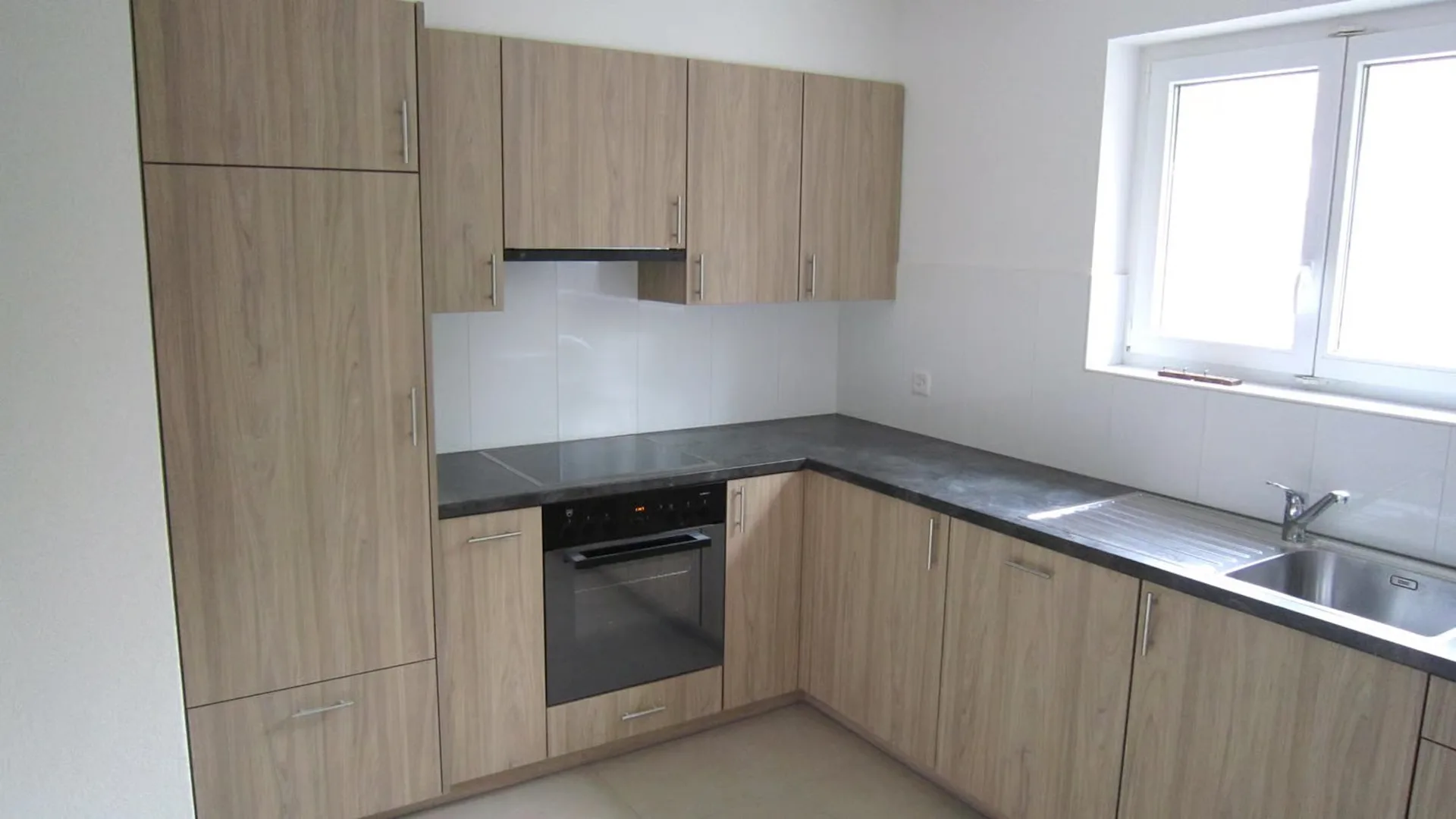 Wohnung mit 3 Zimmern und Balkon im Erdgeschoss
