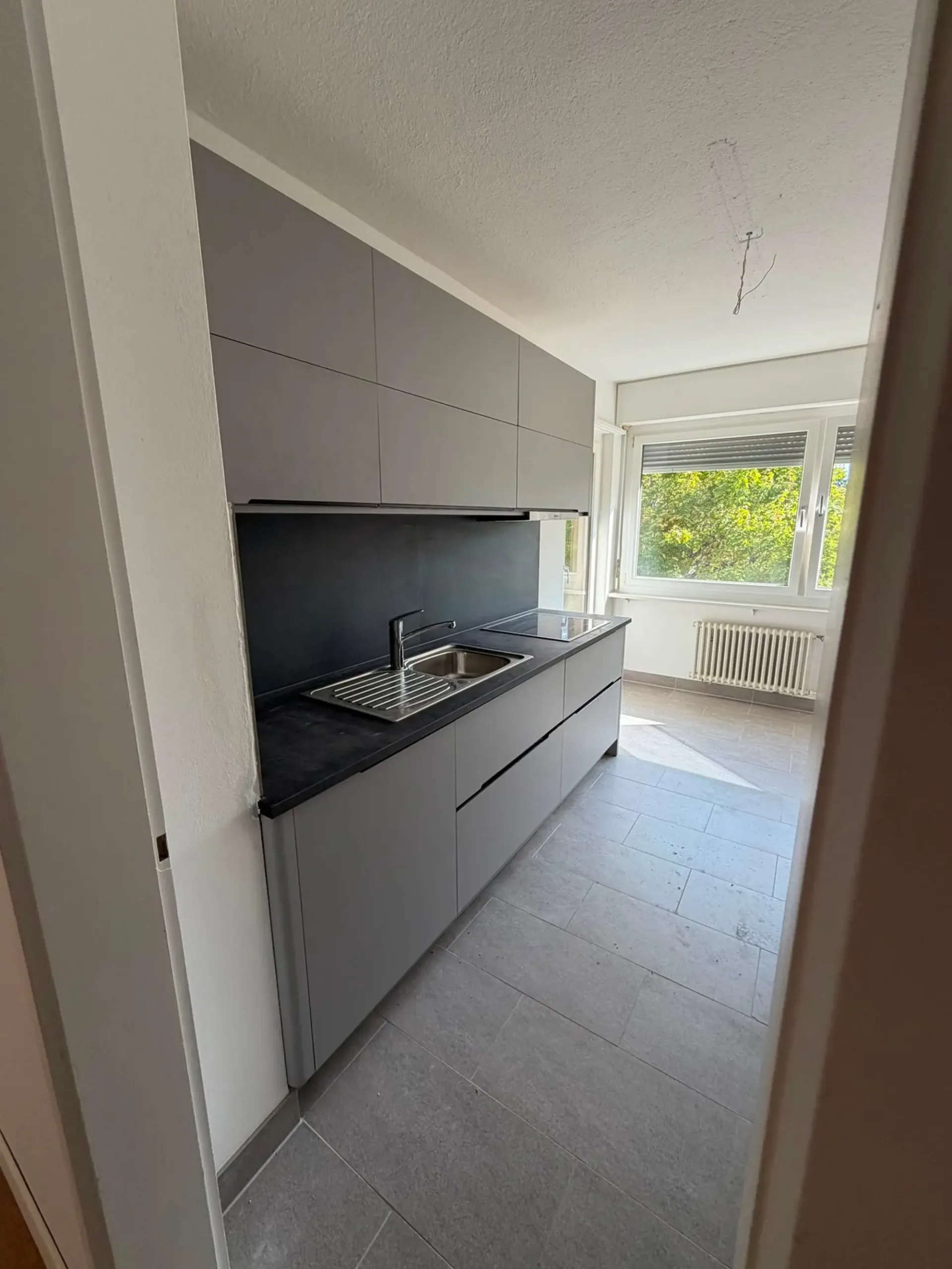Appartement 3 pièces rénové avec balcon à Le Landeron