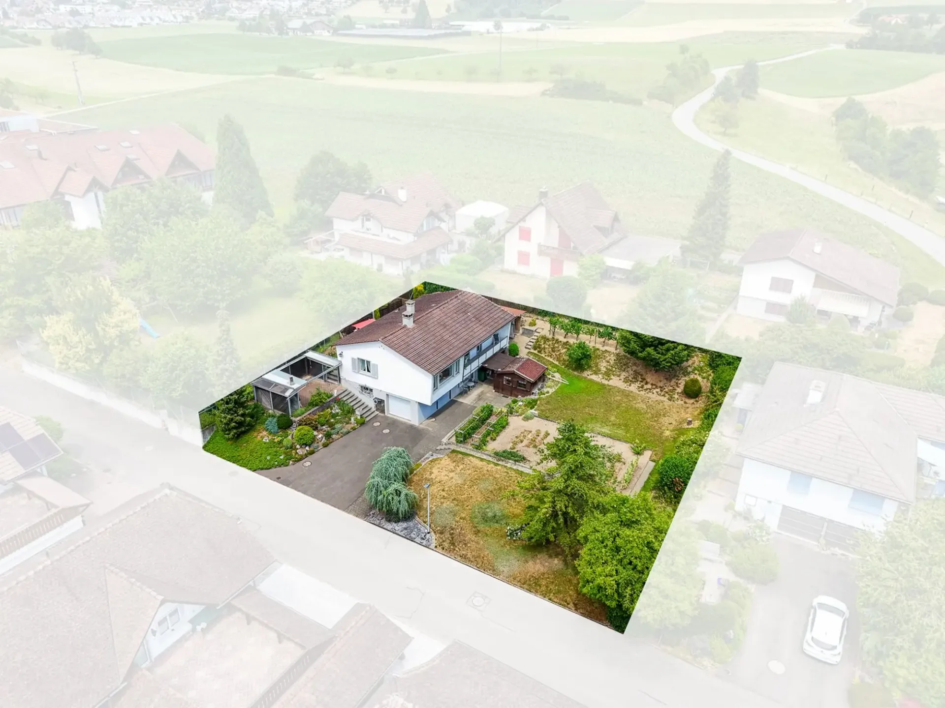 Baulandparzelle mit bestehendem Einfamilienhaus