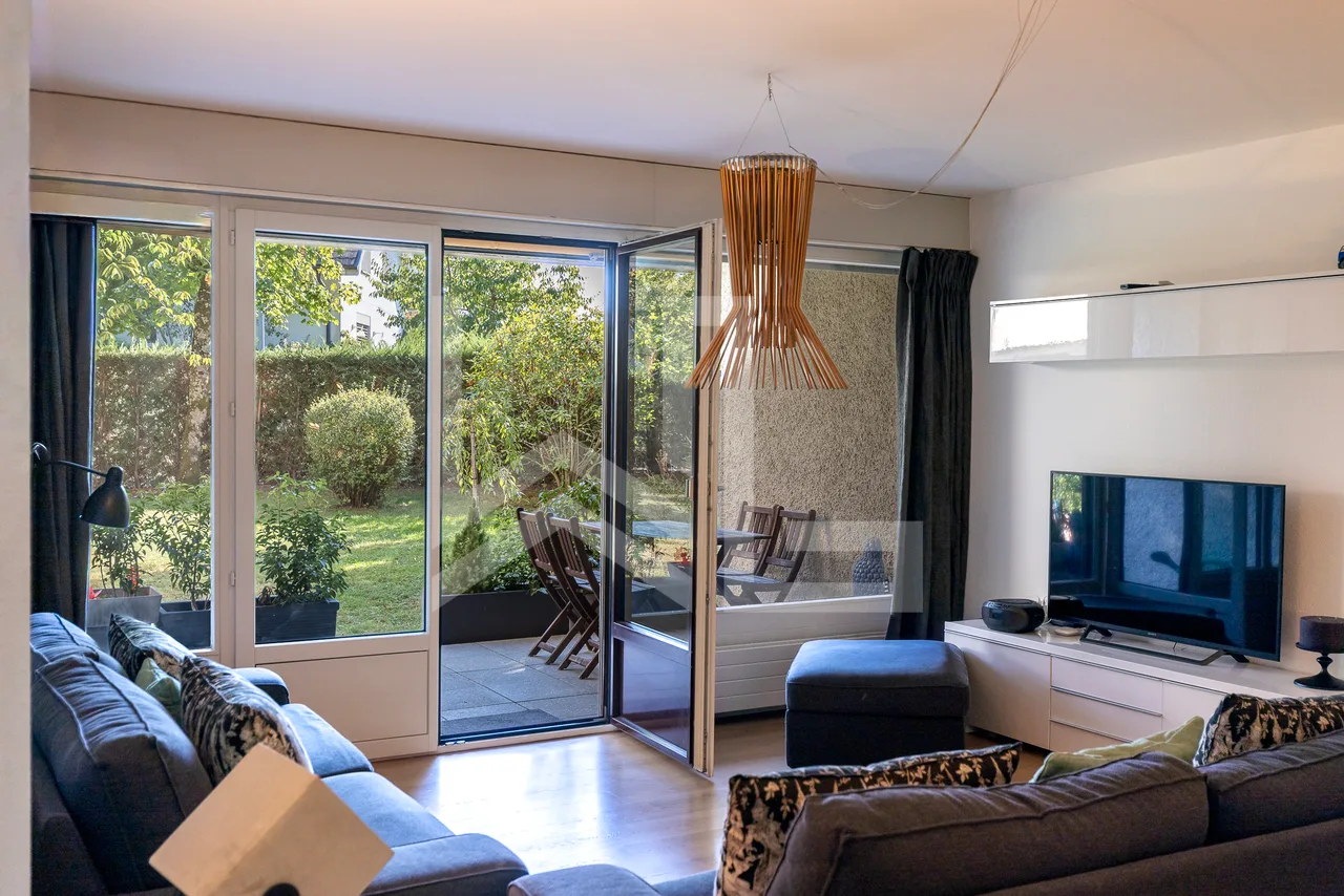 Appartement traversant avec jardin commun à 2 pas de la gare