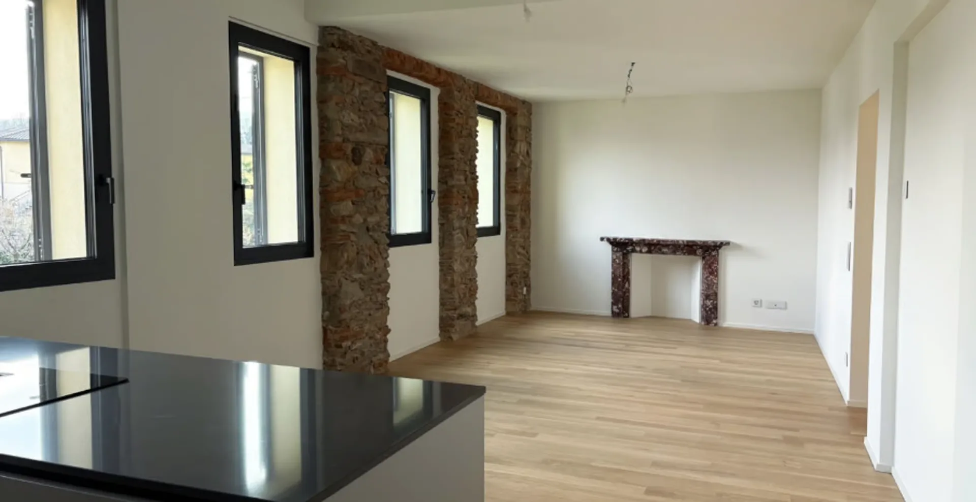 Modernes 3.5-Zimmer-Apartment im 1. Stock mit Seeblick in Pura - Komfort in ruhiger Lage