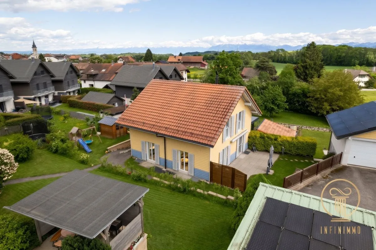 EXCLUSIVITE! A 3' de GIMEL - jolie villa jumelle de 5.5 pièces dans un quartier calme et très agréable.