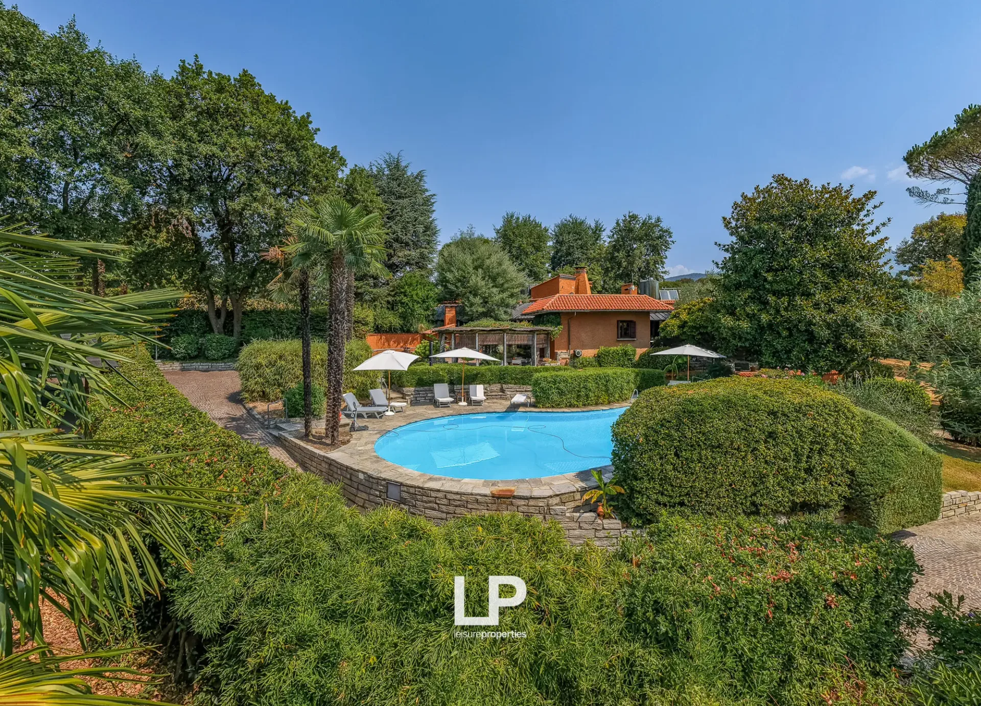 Designer villa with park, pool, and panoramic terrace in Besozzo