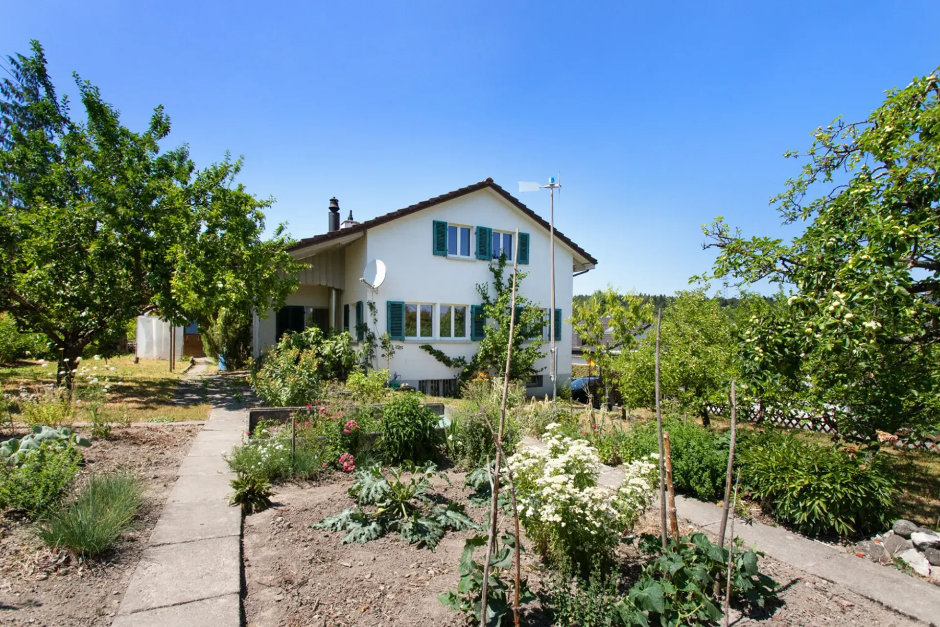 Charmantes 5.5-Zimmer-Einfamilienhaus mit traumhaftem Garten in ruhige