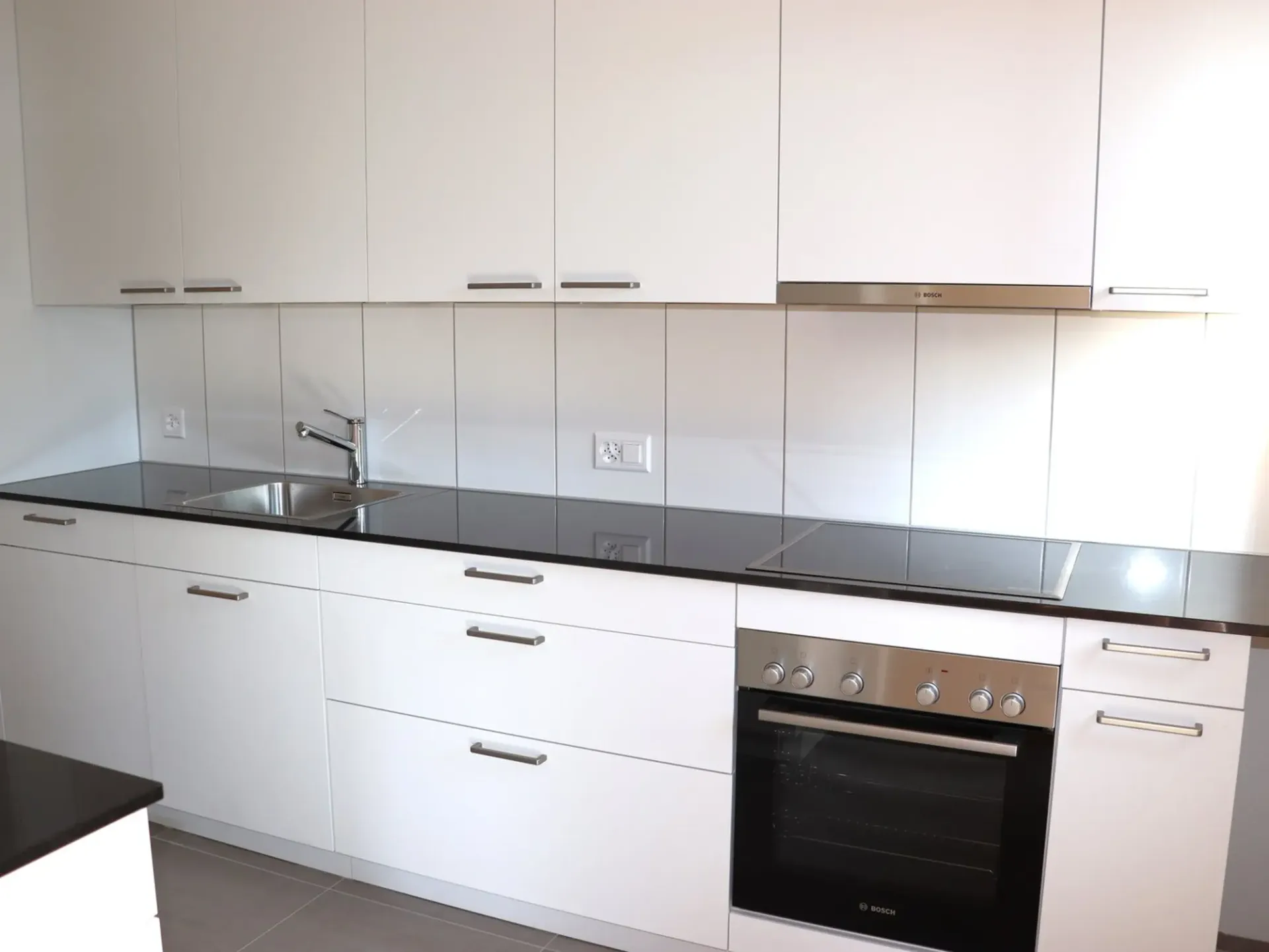 Appartement de 3,5 pièces rénové avec terrasse et balcon