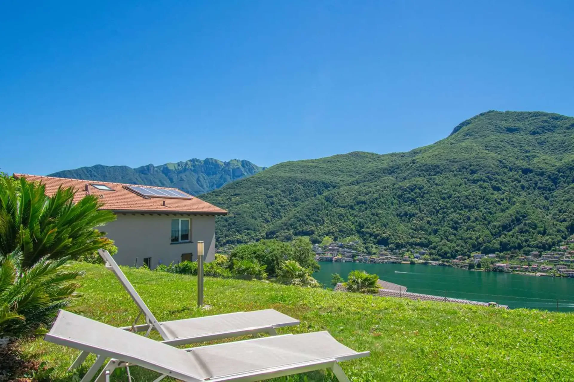 Appartement mit Seeblick und Garten