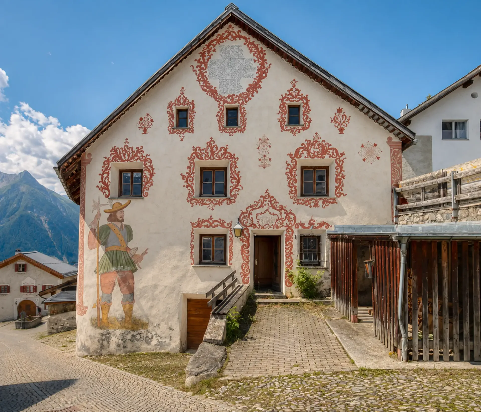 Idylle alpine à Tschlin : Maison engadine spacieuse avec étable