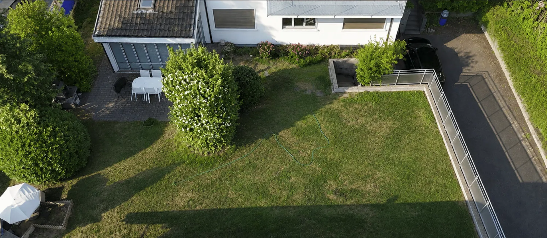 Grosszügige 5.5-Zimmer-Gartenwohnung mit Wintergarten, Cheminée und Parkplatz