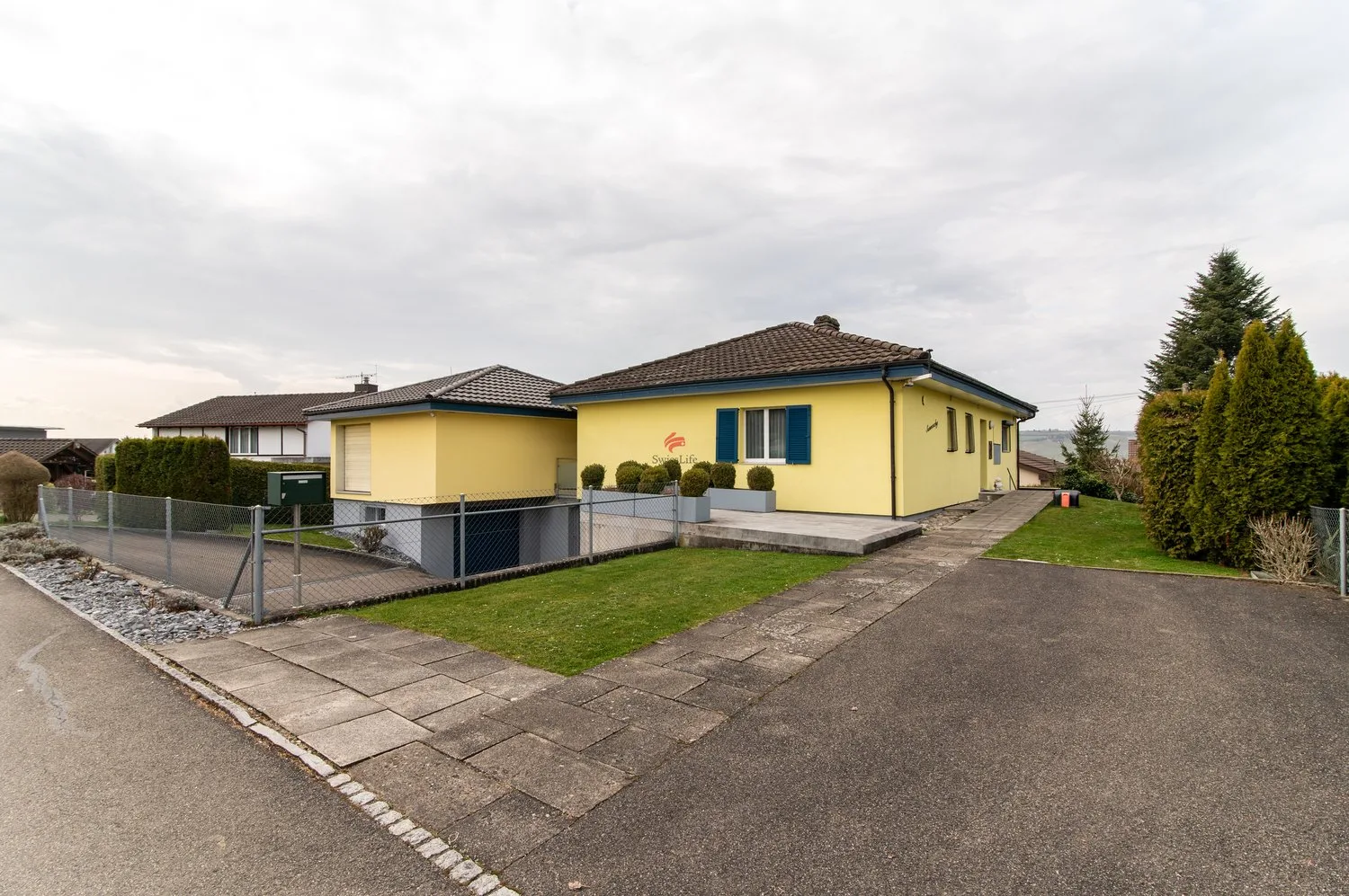 Einfamilienhaus mit Werkstatt + Atelier