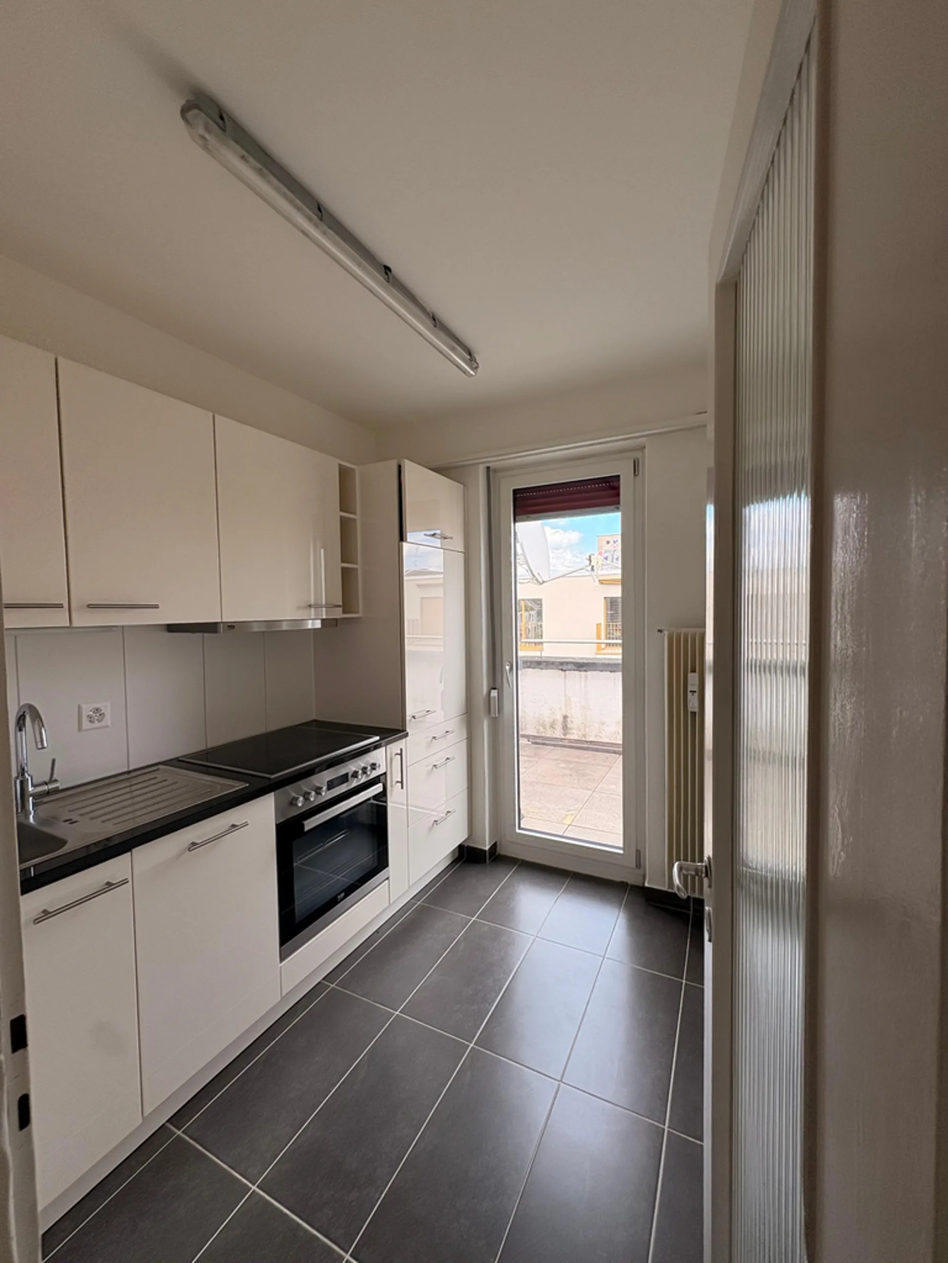 Charmante Wohnung im obersten Stock mit grossem Balkon