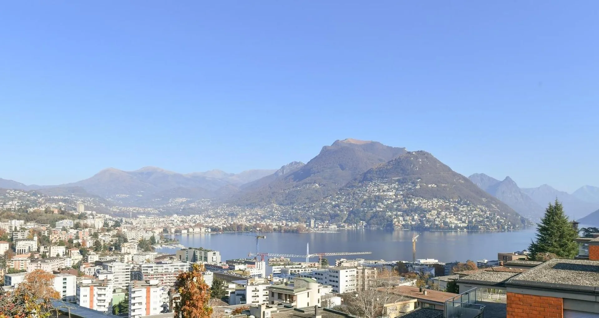 Exklusives Attika-Penthouse in Paradiso mit 360° Seeblick als Zweitwohnsitz erwerbbar.