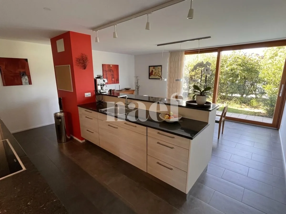 Bel appartement en triplex de 6.5 pièces avec terrasse et jardin