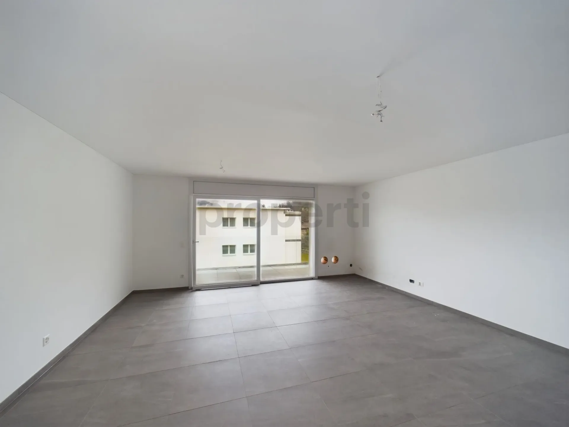 Modernes 3.5-Zimmer-Apartment in Caslano