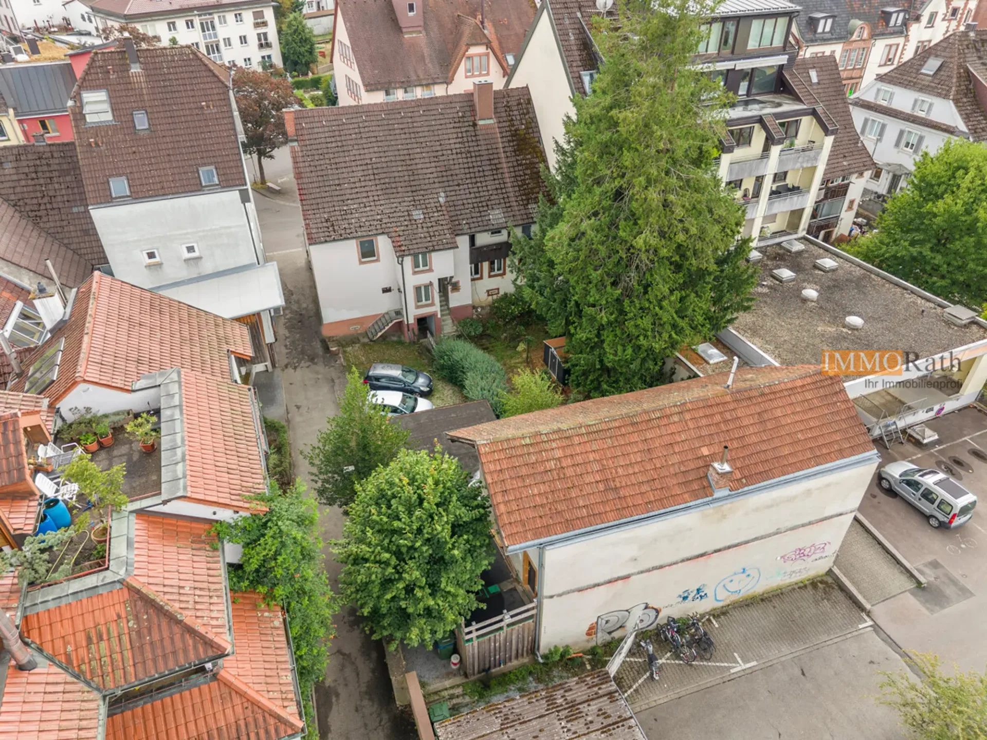 IMMORath.de - Zwei Häuser mit Ladenfläche und Garten