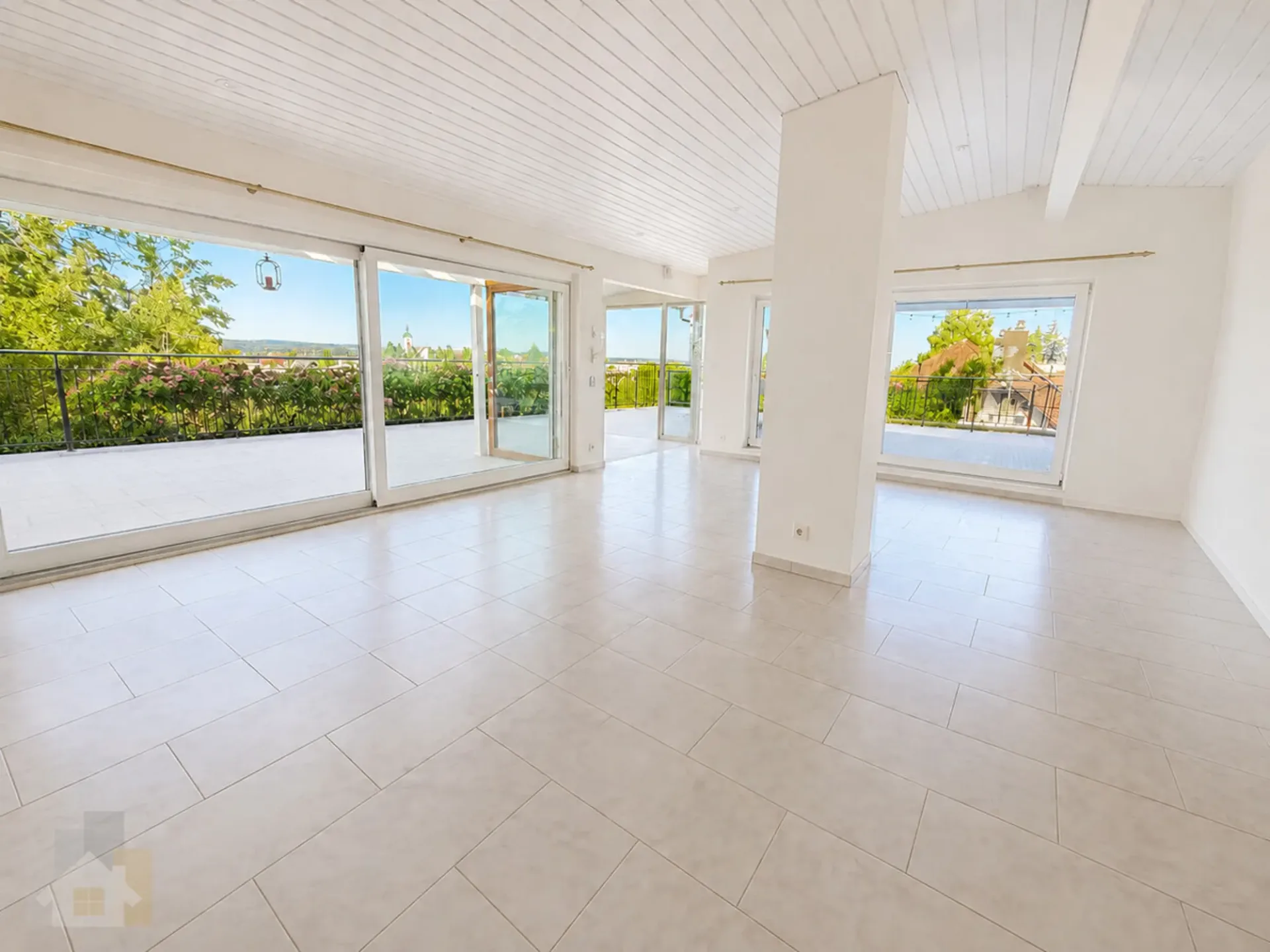 Penthouse apartment with 230 m2 terrace, private lift, and lake view