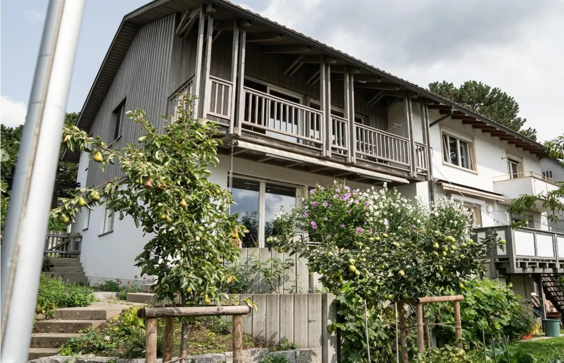 Maison à deux familles dans le Zurich Oberland avec vue sur le lac !