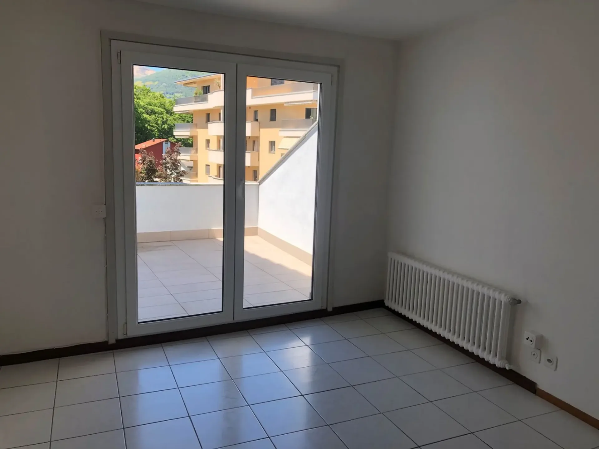 Affitasi appartamento di 3.5 locali a Porza
