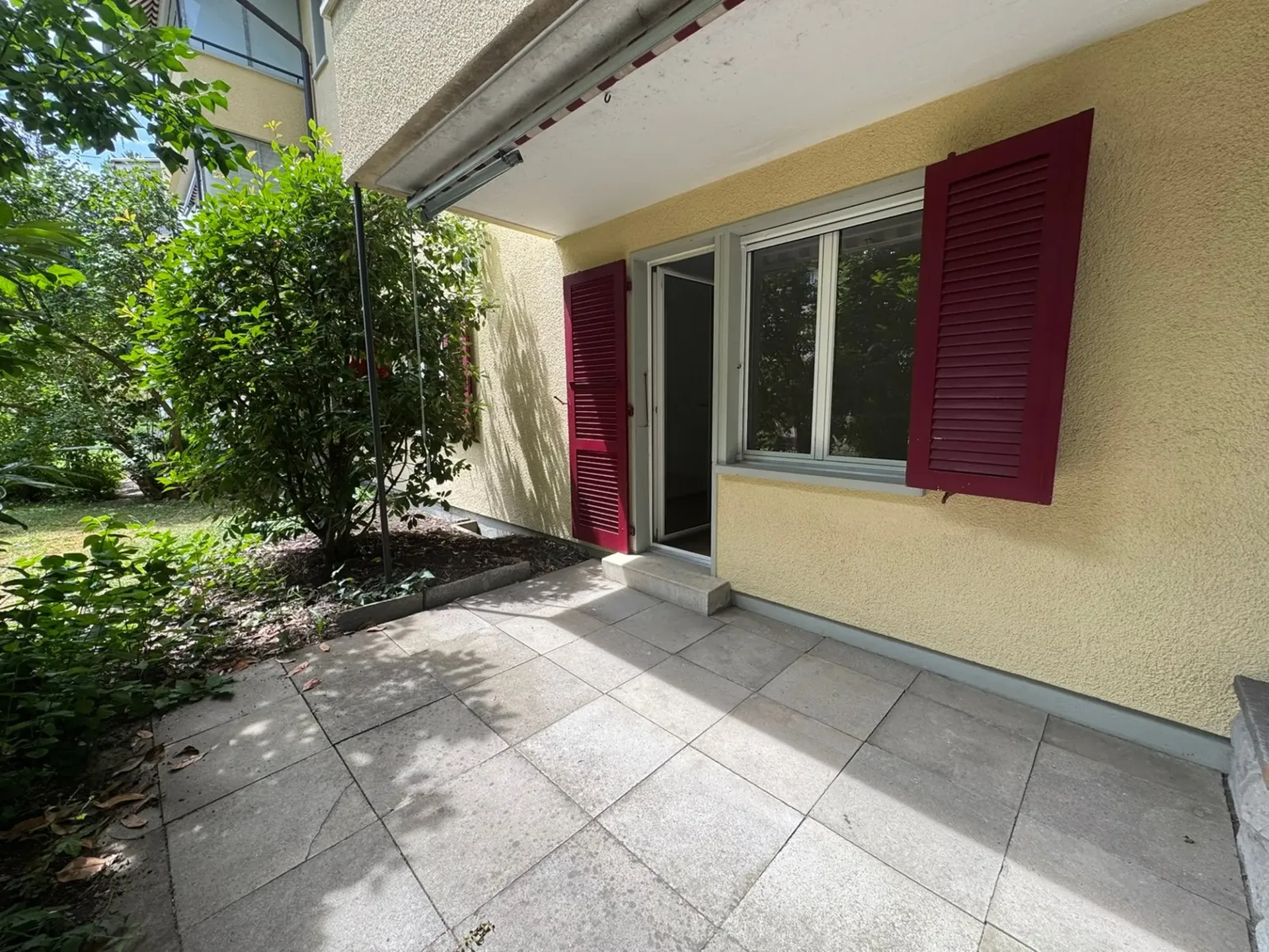 Cozy 2-room apartment with private garden seating area.