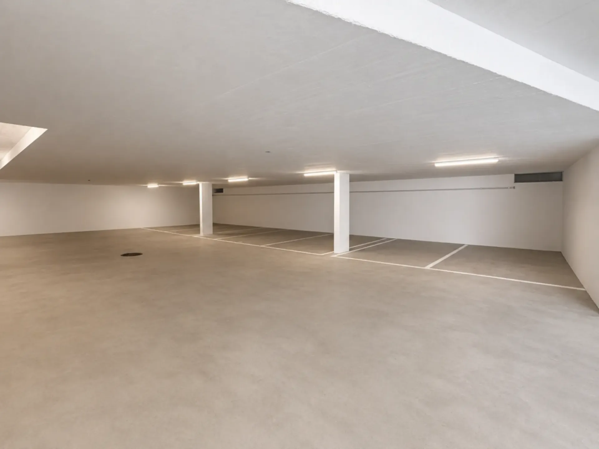 Einstellhallenplätze in MFH-Neubau zu vermieten