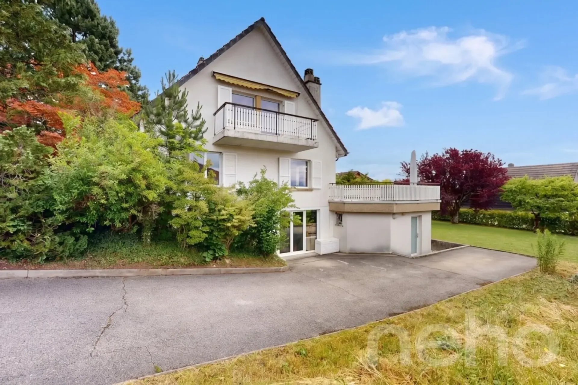 Einfamilienhaus mit großem Garten und Büro in Colombier