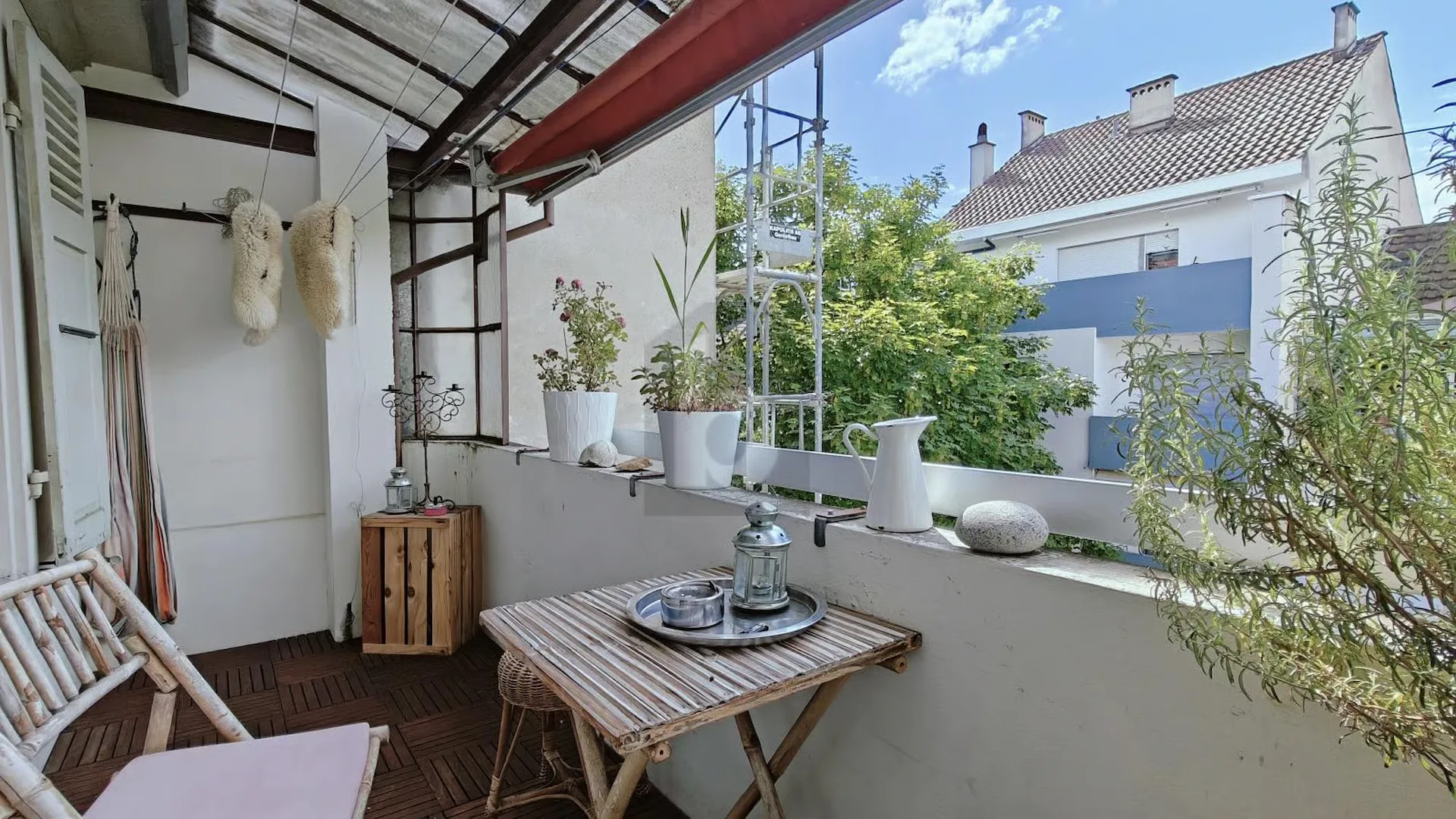 Charming old-building charm with covered balcony
