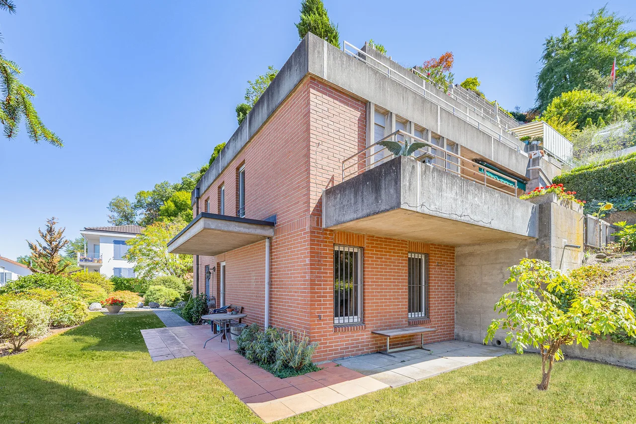 Stilvoll wohnen in einem Terrassenhaus mit eigenem Garten