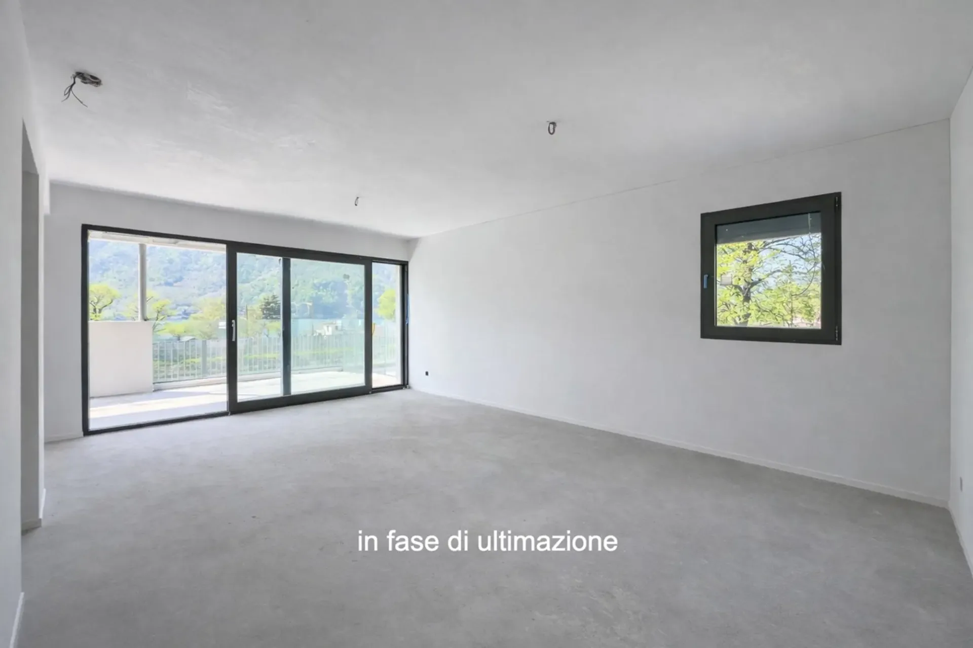 Modernes und neues 3.5-Zimmer-Duplex mit Garten in Melano
