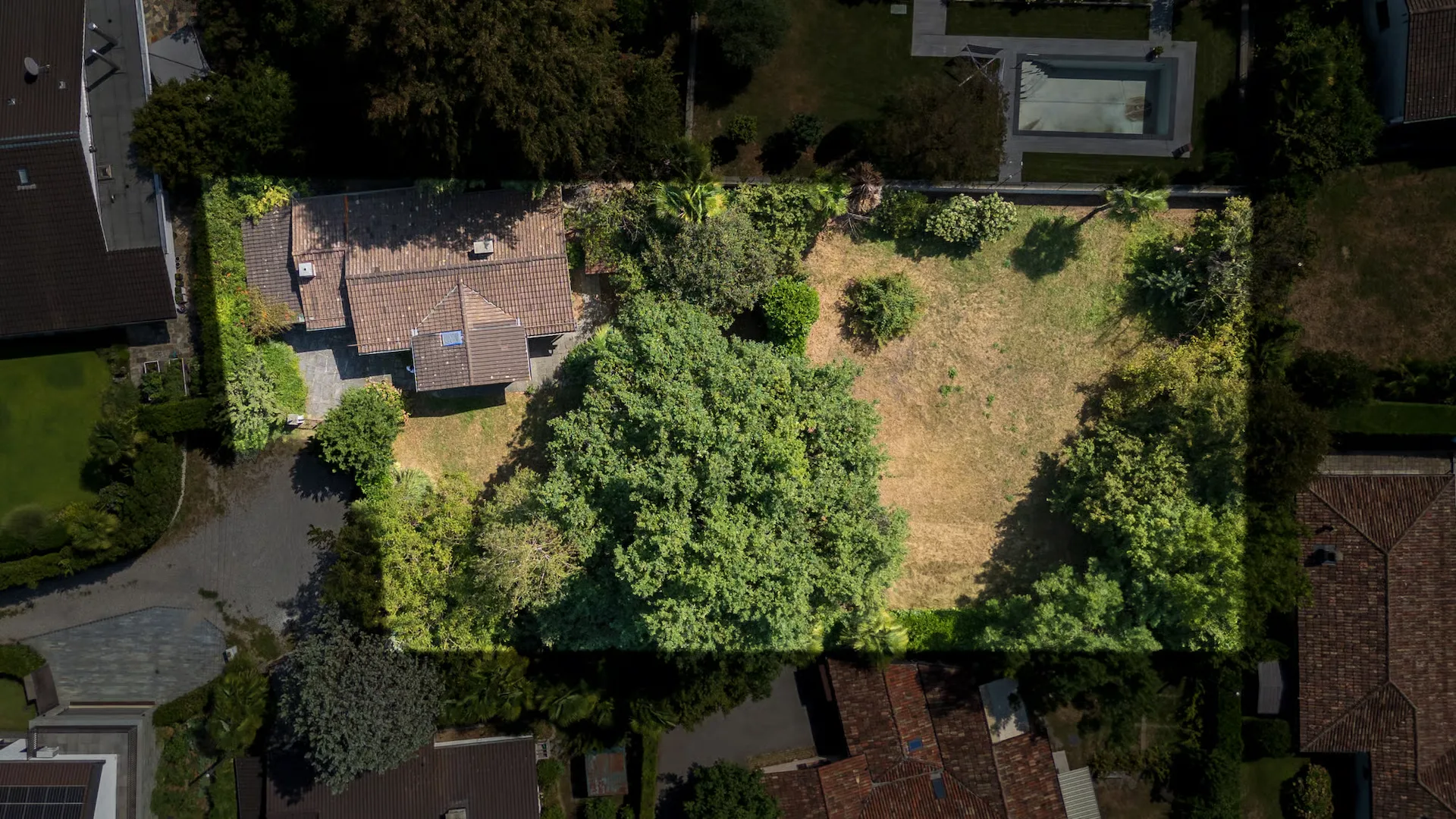 Terreno attraente con oggetto di demolizione a Origlio TI