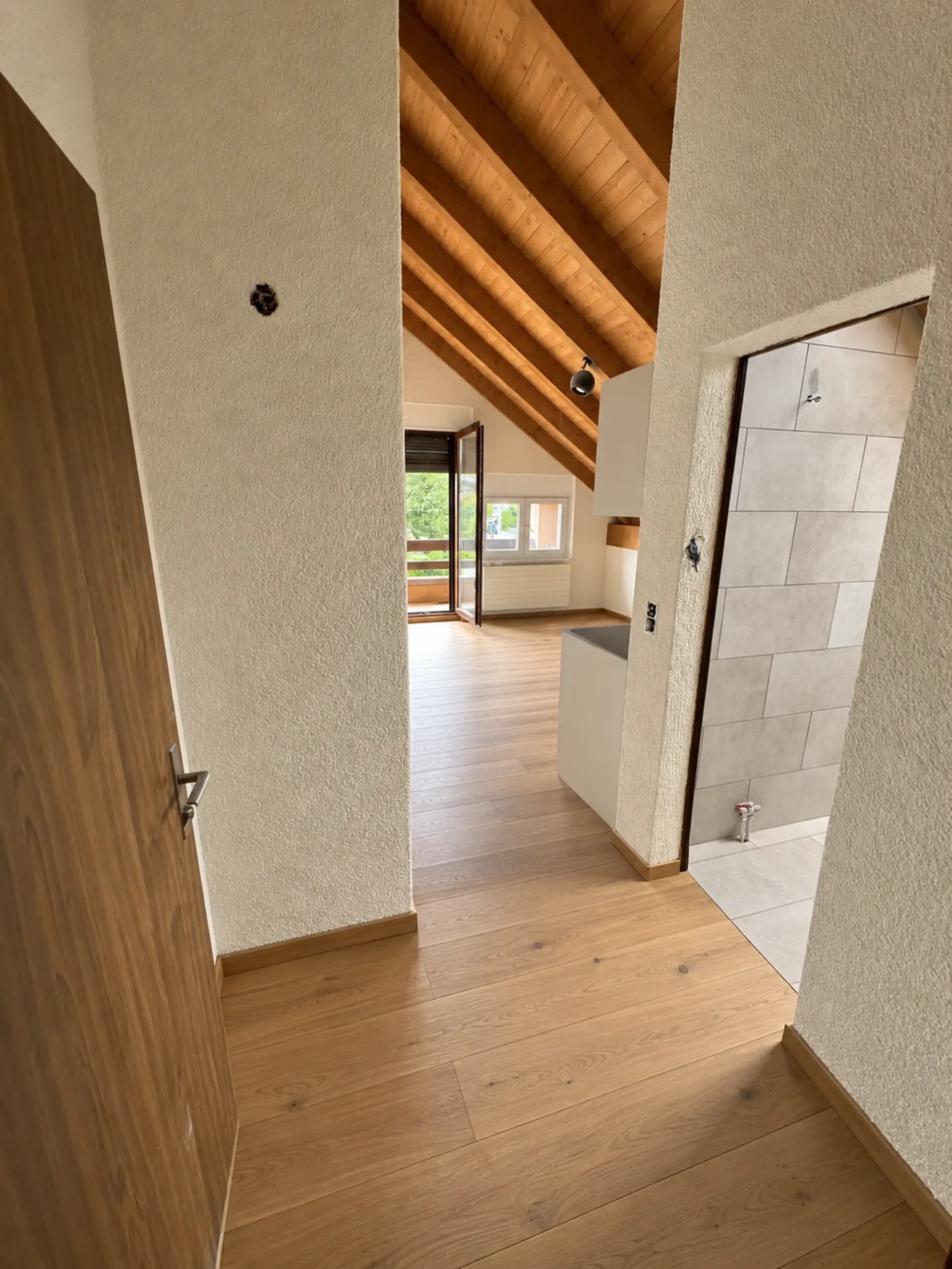 1-room attic apartment with balcony – first occupancy after complete renovation