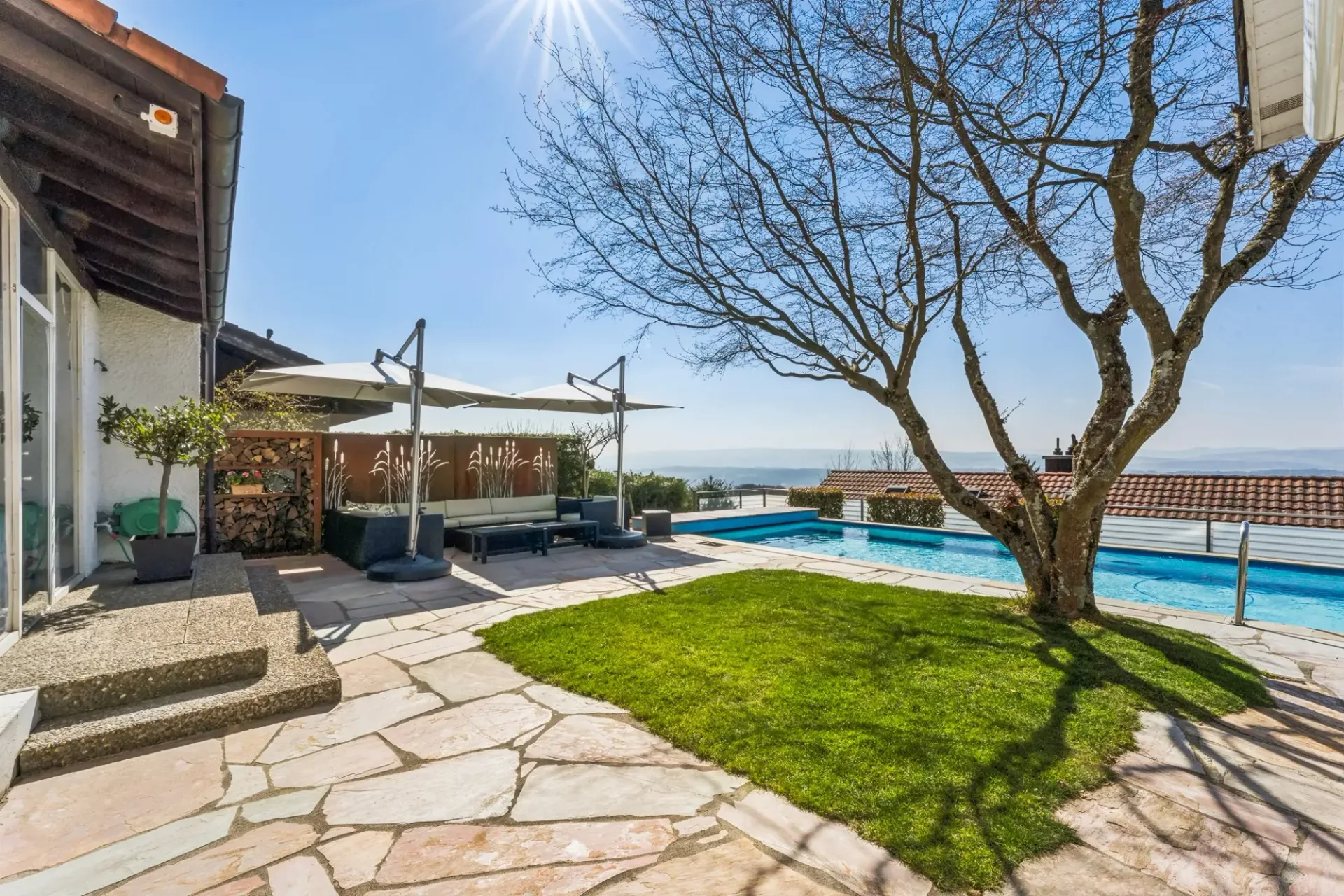 Stylish family home with garden, view, and pool
