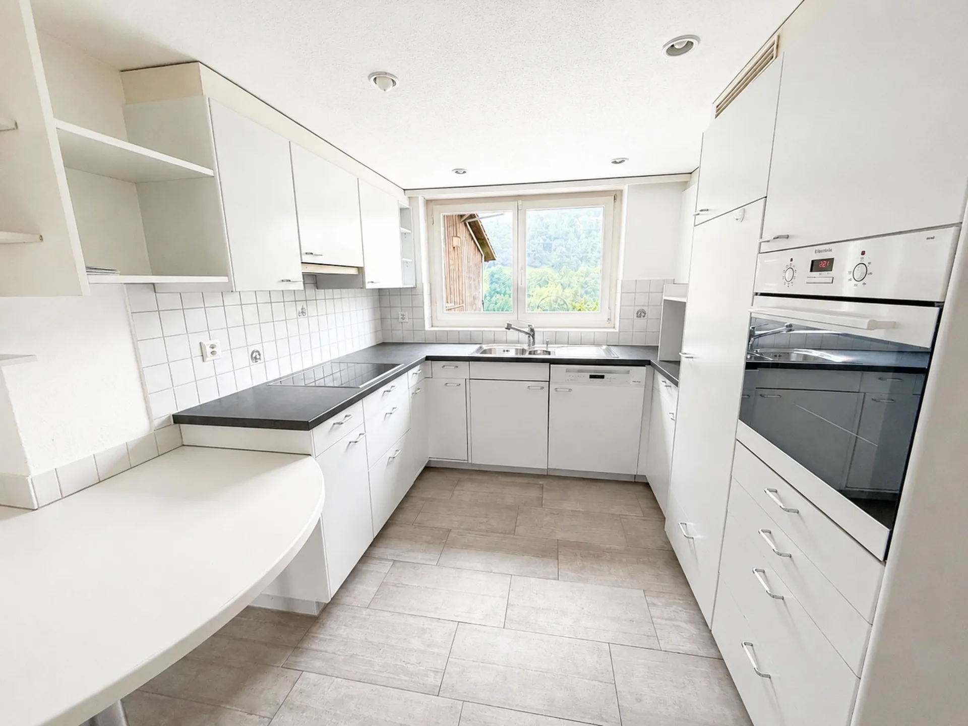Familienfreundliche 6.5-Zimmer-Haushälfte